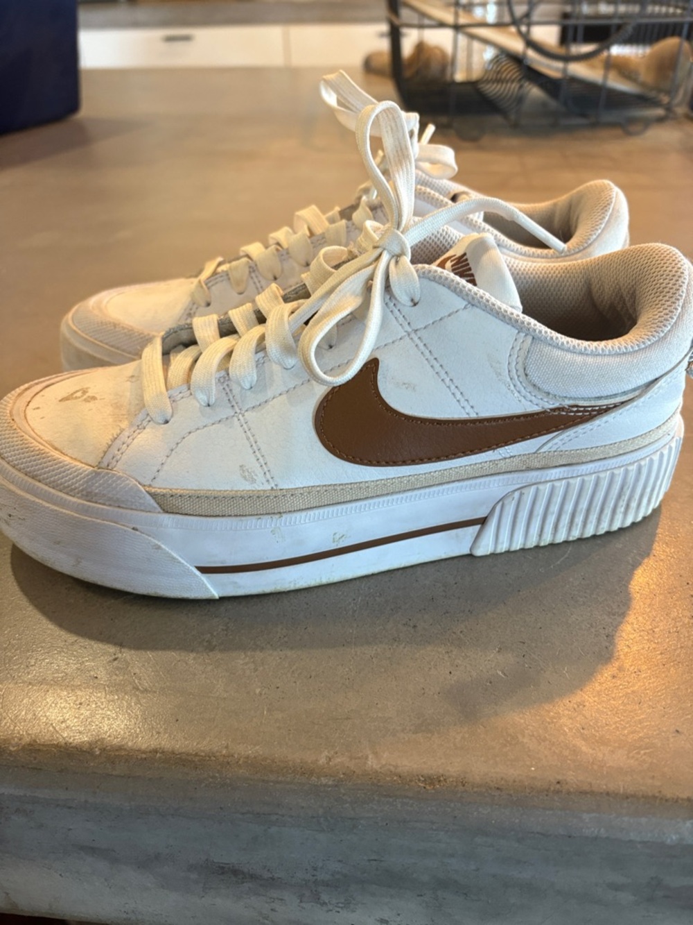 Nike White Sneakers with Brown Swoosh and Platform Sole